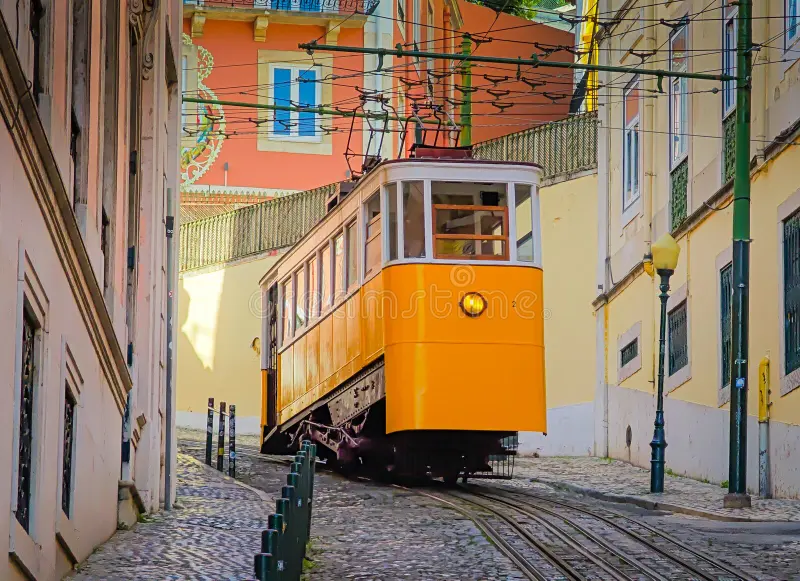 A low-angle shot of the iconic Lisbon tram tracks.